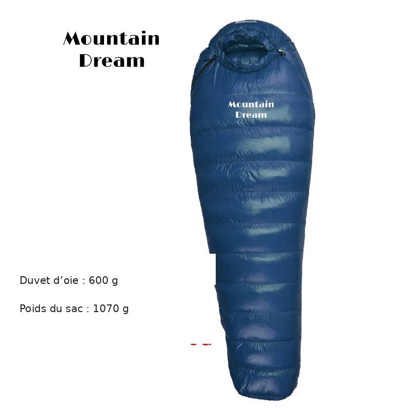 Sac de couchage en duvet d’oie : garnissage 600 g, poids du sac 1070 g.