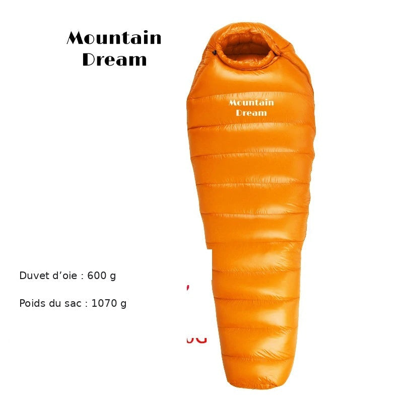 Sac de couchage en duvet d’oie : garnissage 600 g, poids du sac 1070 g.